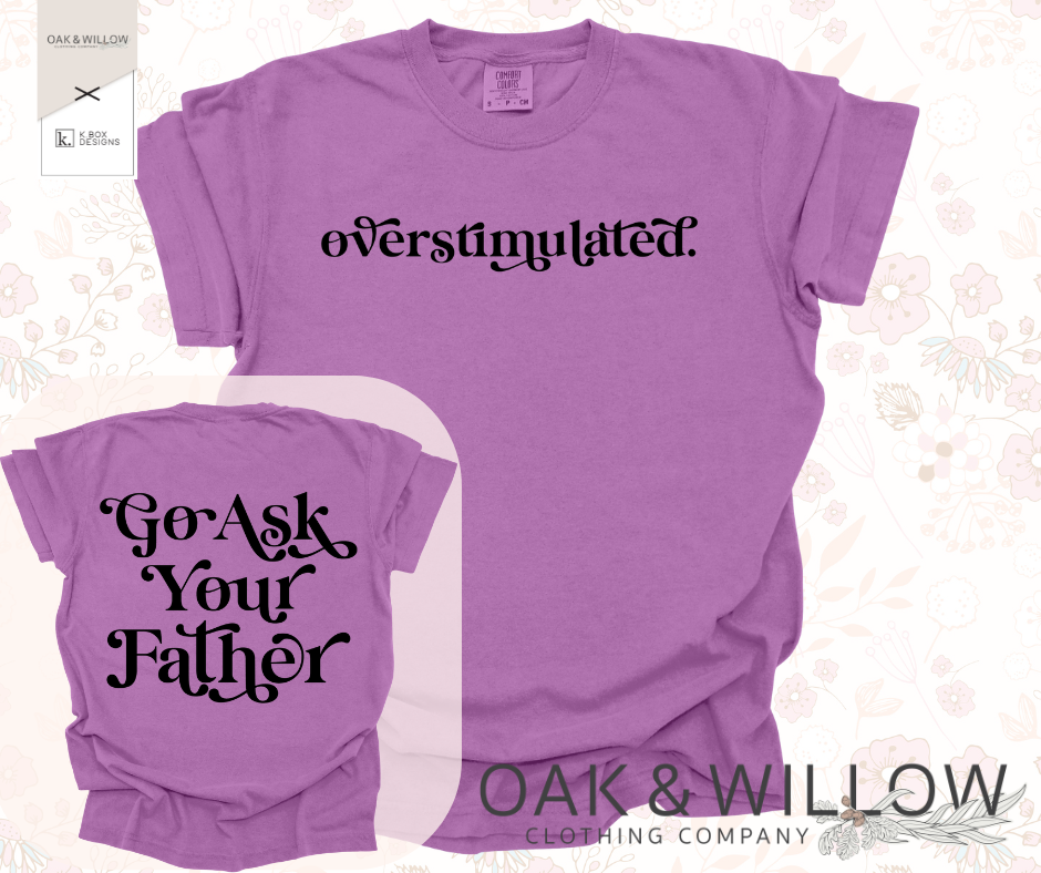 Vibrant purple comfort colors tee with a black script design for overstimulated mothers that just want their kids to go ask their Father instead!