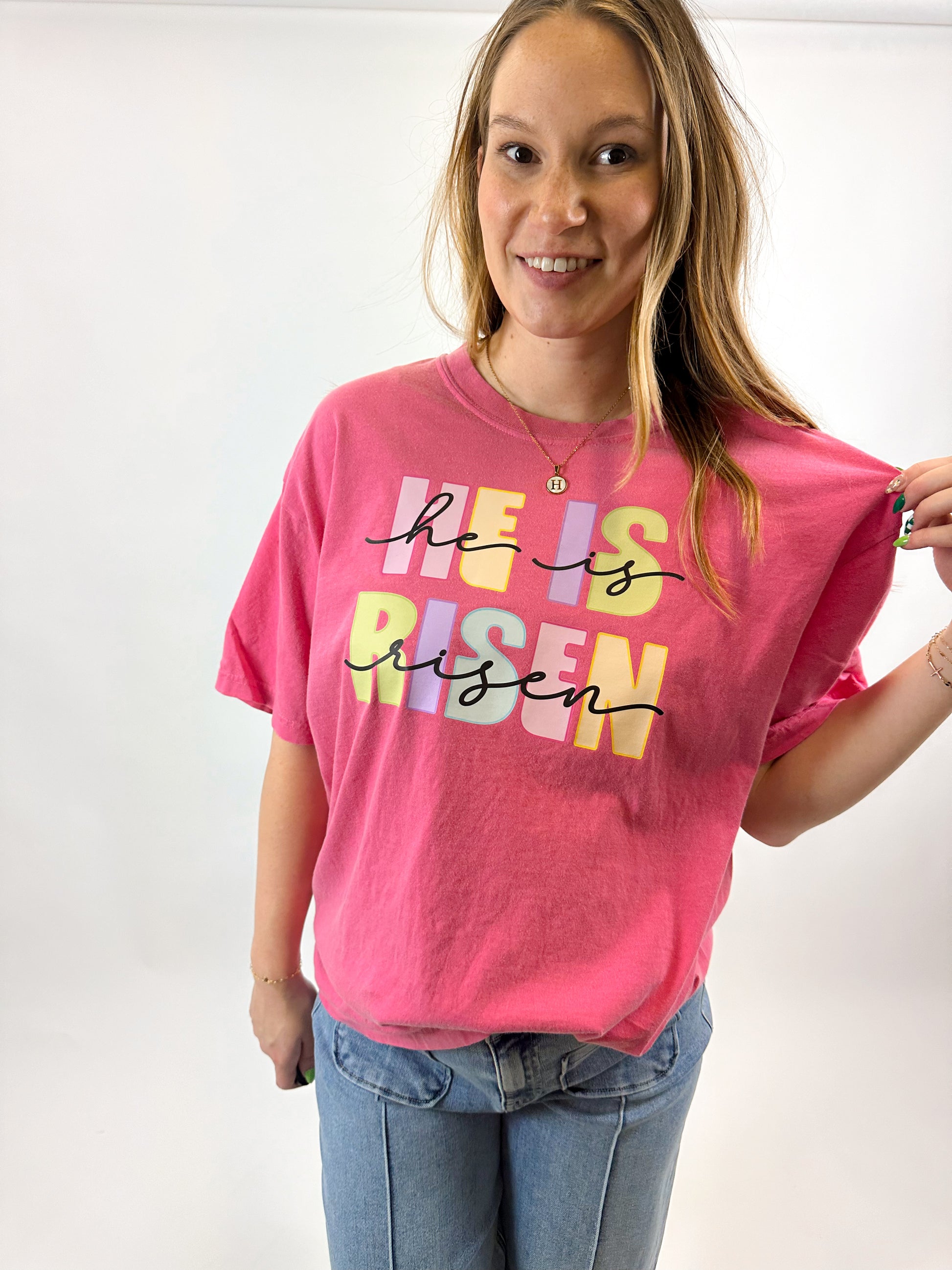 Sport this cute He Is Risen graphic tee this Easter. This tee is an Oak and Willow x K.Box Design collab, perfect for the Spring season.
